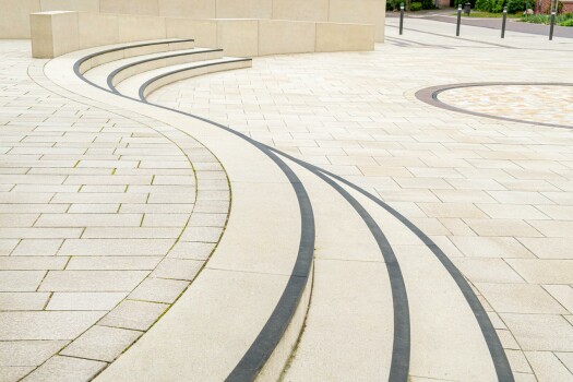 Garrel (D), School and sports center, Umbriano Granite beige, textured.