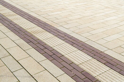 Garrel (D), School and sports center, Umbriano Granite beige, textured.