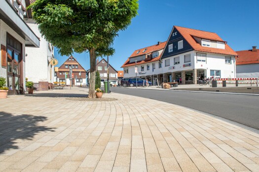 Waldeck (D), City centre, Umbriano Granite beige, textured.