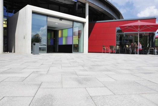 Rendsburg (D), Shopping center Rondo, Umbriano Grey granite-white textured.